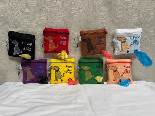 Colourful zip pouches featuring playful dog designs, arranged in a row.