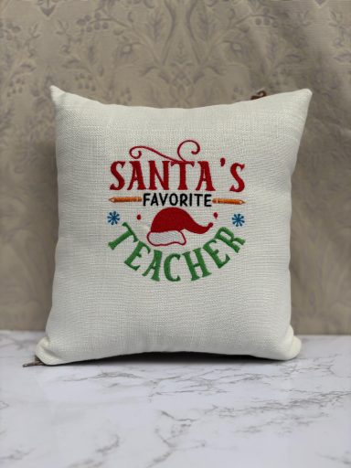 Cushion with the text "Santa's Favourite Teacher" in festive colours.