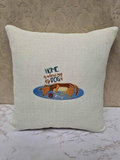 Decorative cushion featuring a playful design of a dog by a water bowl.
