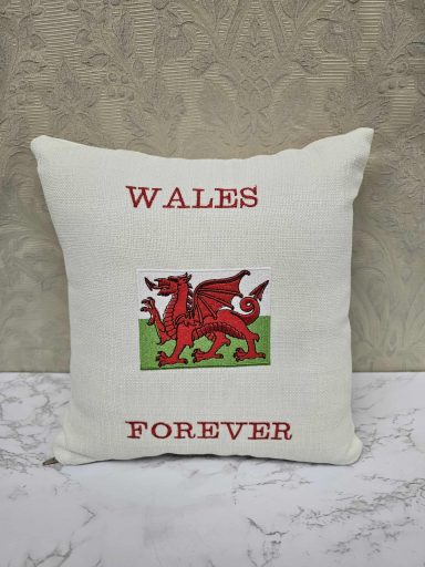 Cushion featuring a red dragon and the text "WALES FOREVER."