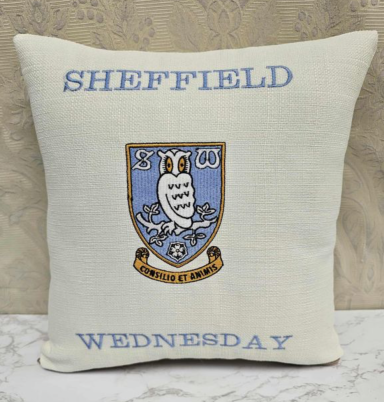 Cushion featuring the Sheffield Wednesday football club crest and the word "Wednesday."