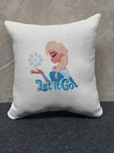 Pillow featuring a stylised image of a character with the text "Let It Go".