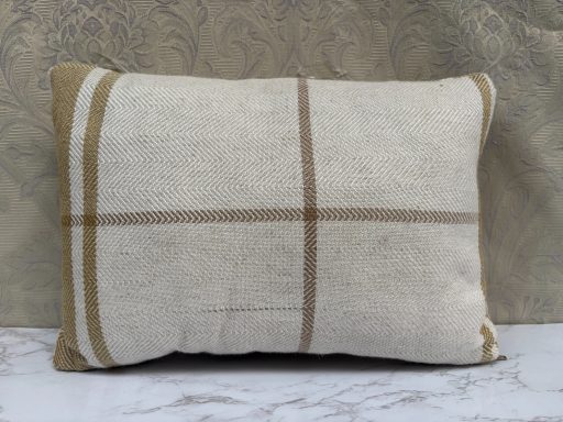 A rectangular cushion with a cream fabric and brown striped pattern.