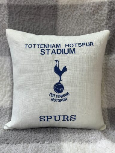 Cushion featuring Tottenham Hotspur logo and text "Tottenham Hotspur Stadium SPURS".