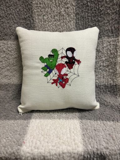 Spidey & Friends Cushion featuring cartoon characters Spider-Man, the Hulk, and Spider-Woman in action poses.