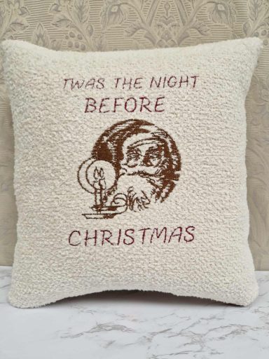 Cream cushion featuring the text "Twas the night before Christmas" and a Santa illustration.
