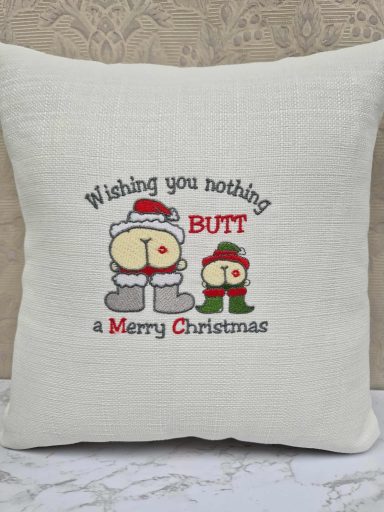 Cushion featuring a festive design with cartoon characters and a humorous Christmas message.