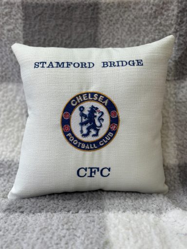White cushion featuring Chelsea Football Club logo and text "Stamford Bridge" and "CFC".