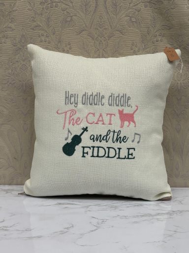 Cushion featuring the text "Hey Diddle Diddle, The Cat and the Fiddle" with a cat and fiddle illustration.