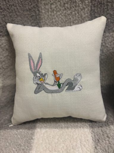 Bugs Bunny Cartoon-style cushion featuring Bugs Bunny relaxing with a carrot.