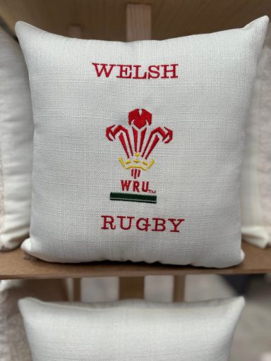 Cushion featuring the Welsh Rugby emblem and text.