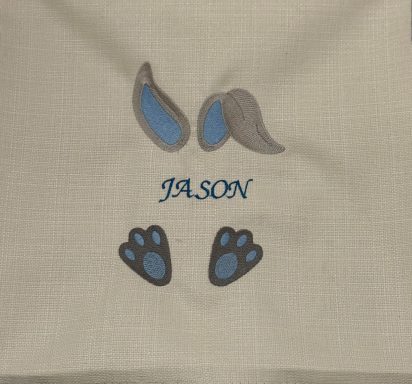 Grey and blue decorative elements resembling animal ears and paws, with the name "JASON" below.